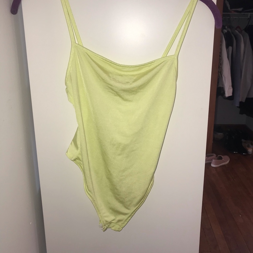 Bright yellow bodysuit